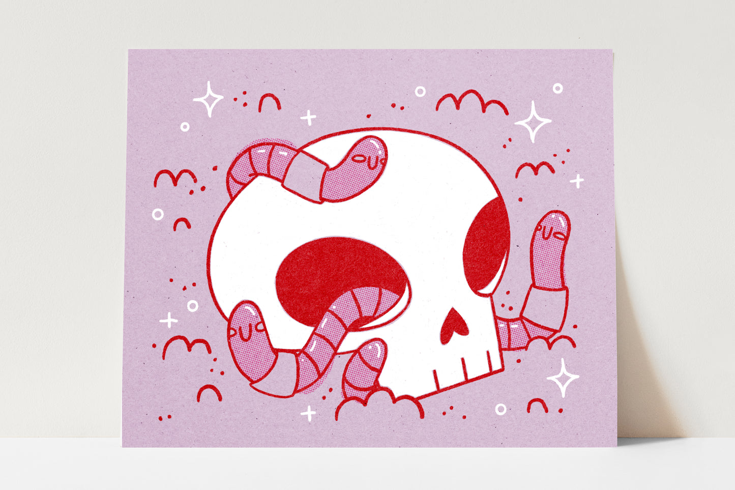 Print of an illustration of a human skull with happy little worms squirming around in it