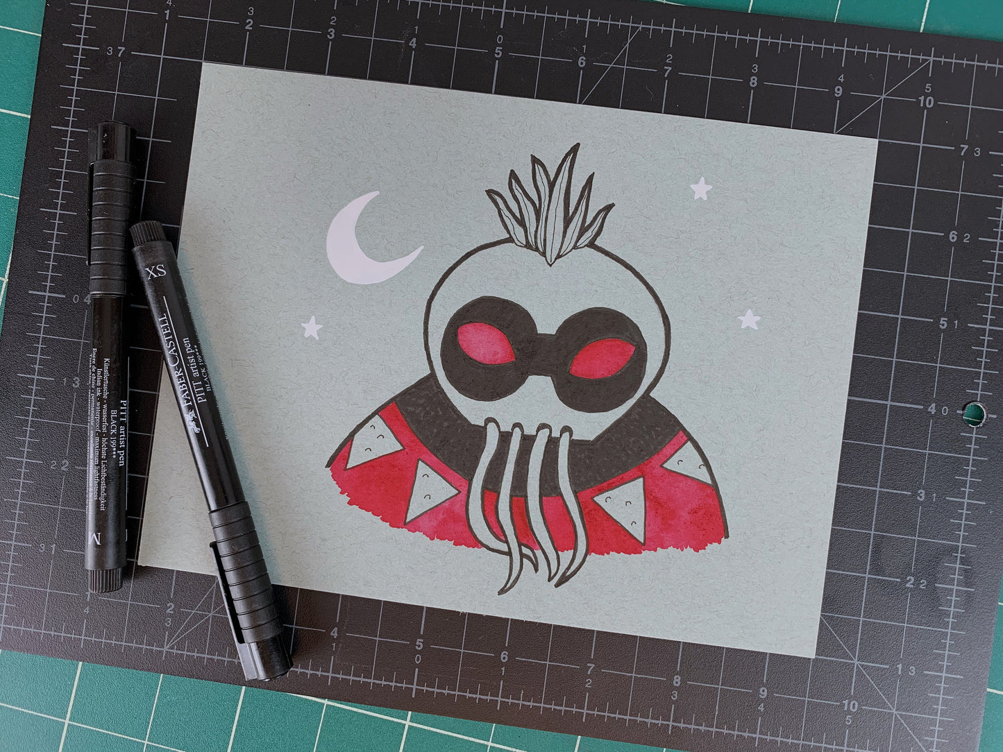 Studio shot of an original illustration of a Hawaiian night marcher legendary warrior with a moon and stars in the background. Made using ink, watercolor, and gouache.