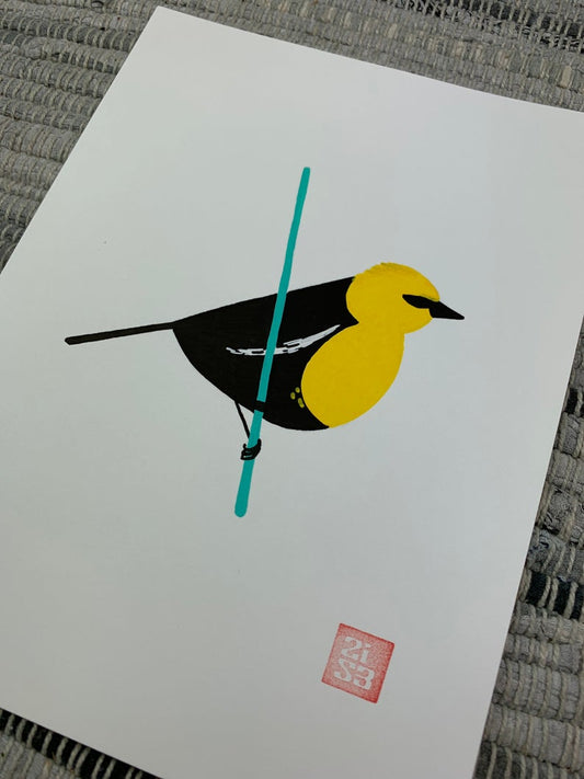 Original artwork of black bird with a bright yellow head standing on a thin wire.