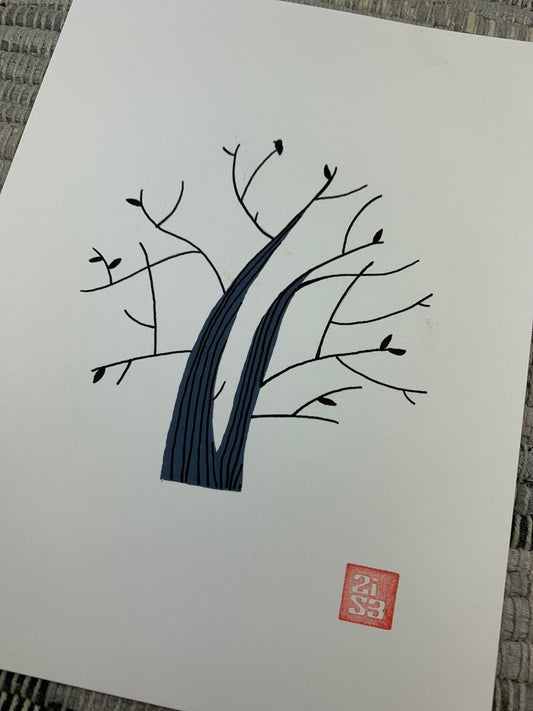 Original artwork of a tree with few leaves on it and a small silhouette of a hummingbird that looks similar to the leaves.