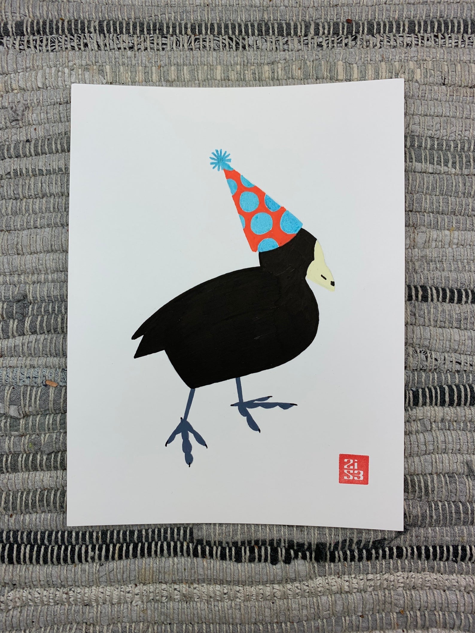 Original artwork of a black water bird, a coot, with a funny little birthday hat on.