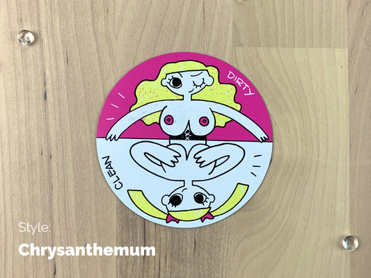 A circular sheet magnet with a sassy illustration of a blonde lady with her top off on the dirty half, and covering her boobies on the clean half.