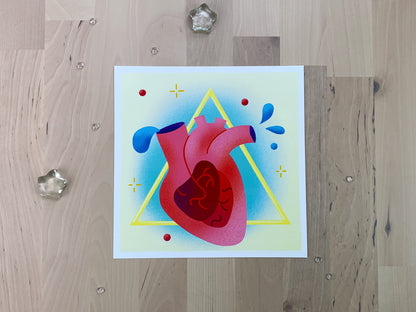 An illustration of a heart with blue blood drops in front of a yellow triangle shape.