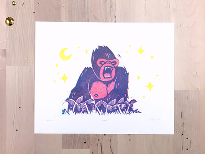 Original limited edition # art print by Amber Orenstein. Two color, pink and turquoise, reduction block print of a King Kong roaring on his jungle island home with yellow stars and moon.