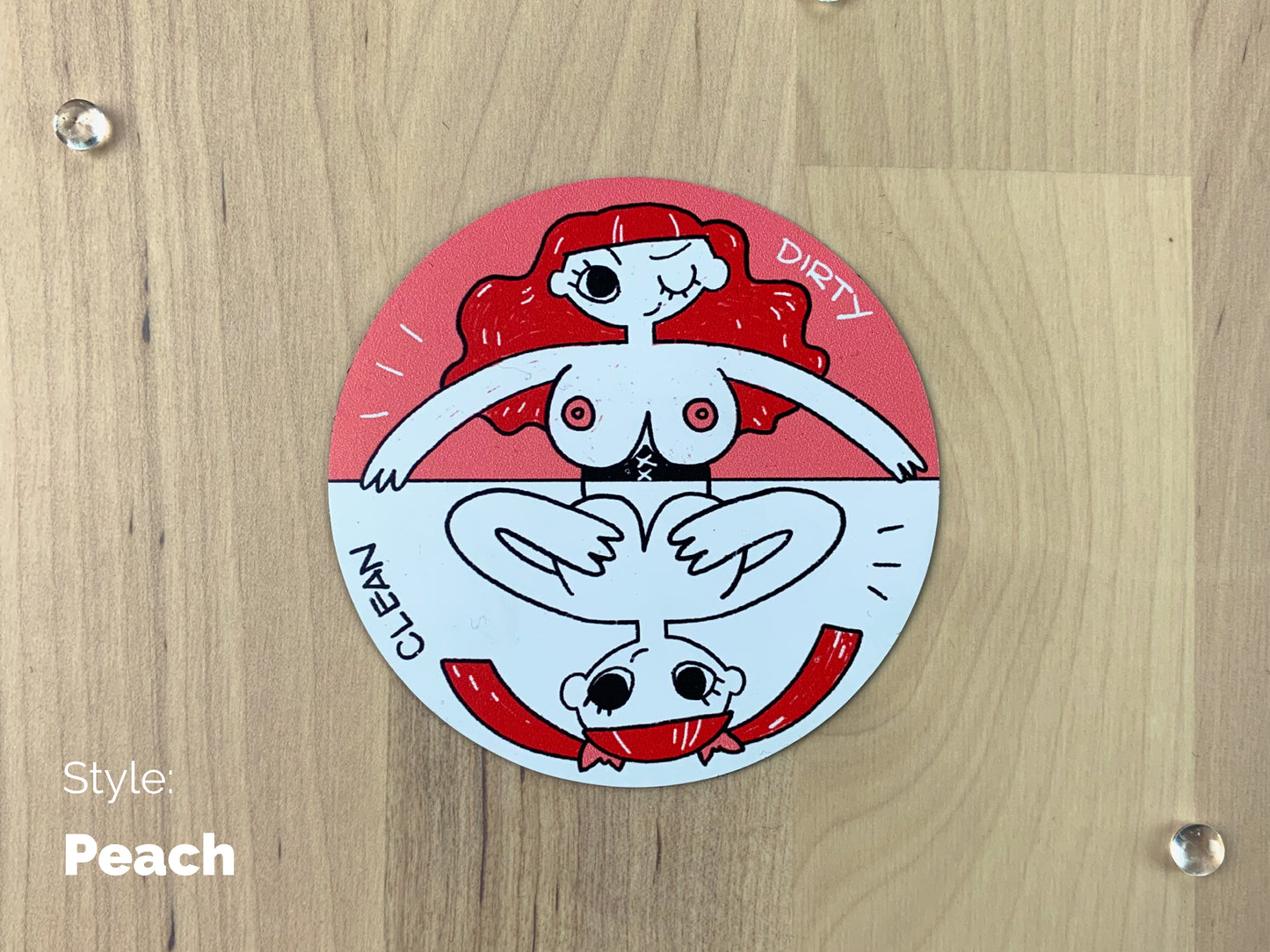 A circular sheet magnet with a sassy illustration of a redhead lady with her top off on the dirty half, and covering her boobies on the clean half.