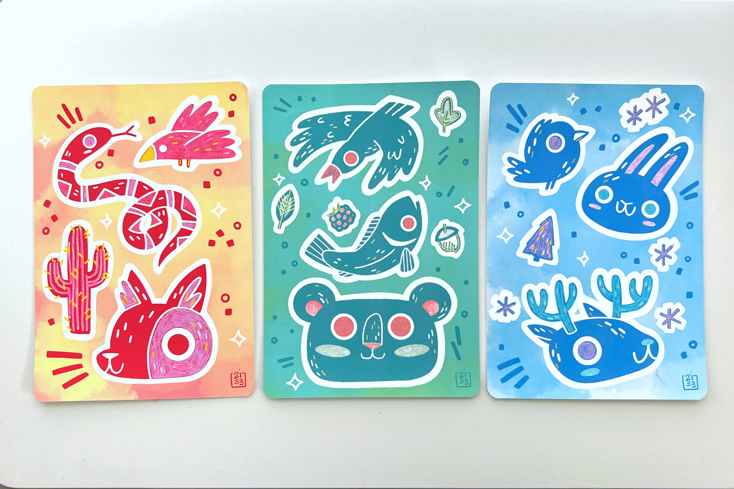 Weatherproof matte sticker sheets in three kiss cut design styles.