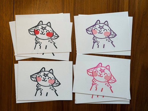 Four variants of block prints of a cute little witchy billy goat.