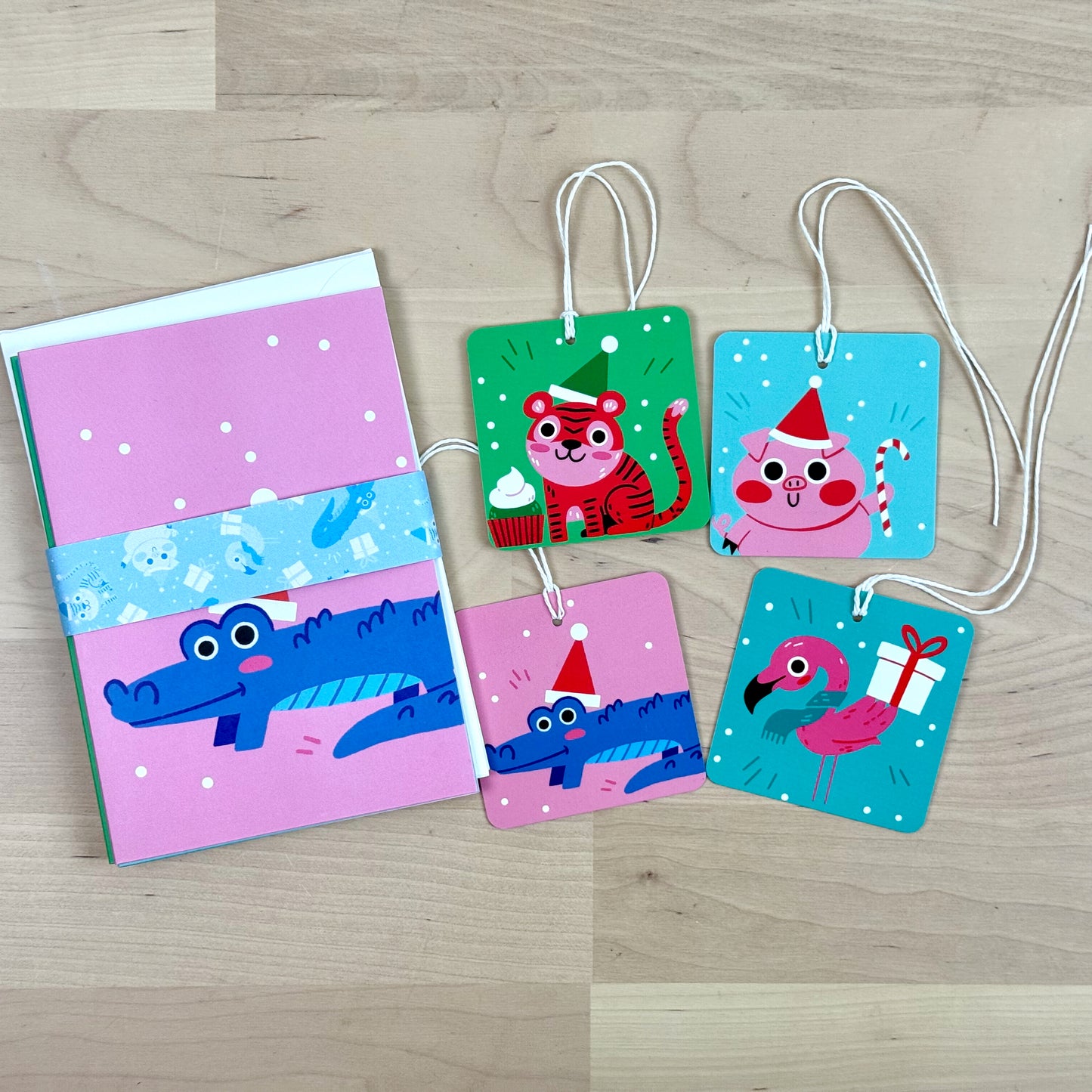 Holiday Party Animals set of four holiday greeting cards with matching reusable gift tags