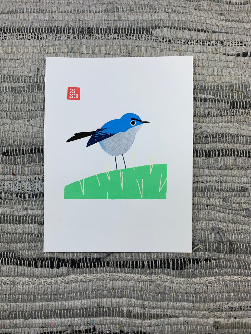 Original artwork of a little angry bird with funny looking "eyebrows" standing on a cactus.