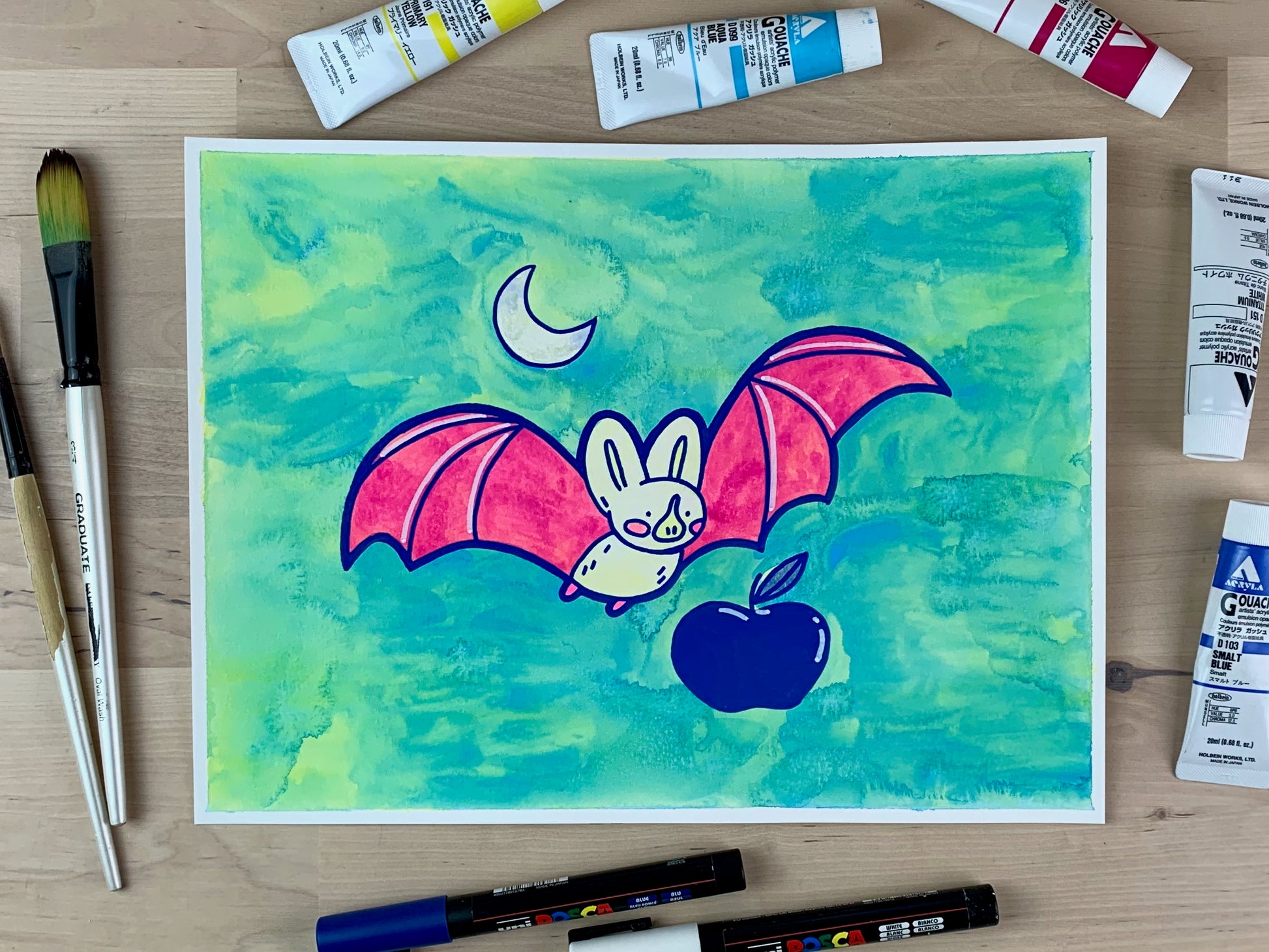 Painting of a white bat with pink wings and yellow nose flying over an apple under a present moon.