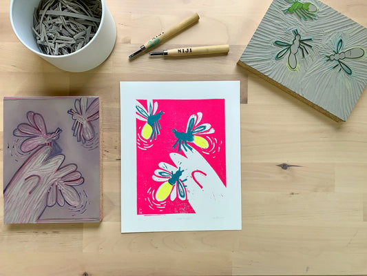 Original linoleum block print artwork showing three fireflies around an outstretched hand on a bright pink background.