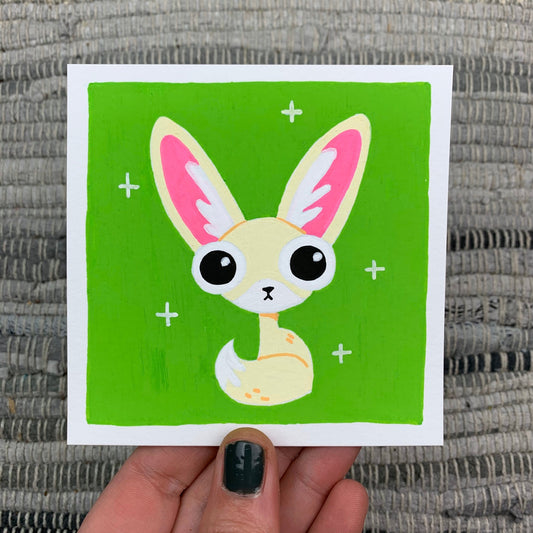 Original artwork of a cute fennec fox on a bright green background. Materials used: Uni-Posca paint markers.