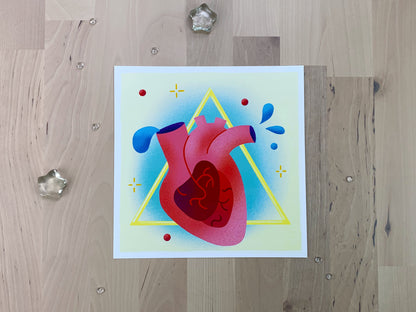 An illustration of a heart with blue blood drops in front of a yellow triangle shape.
