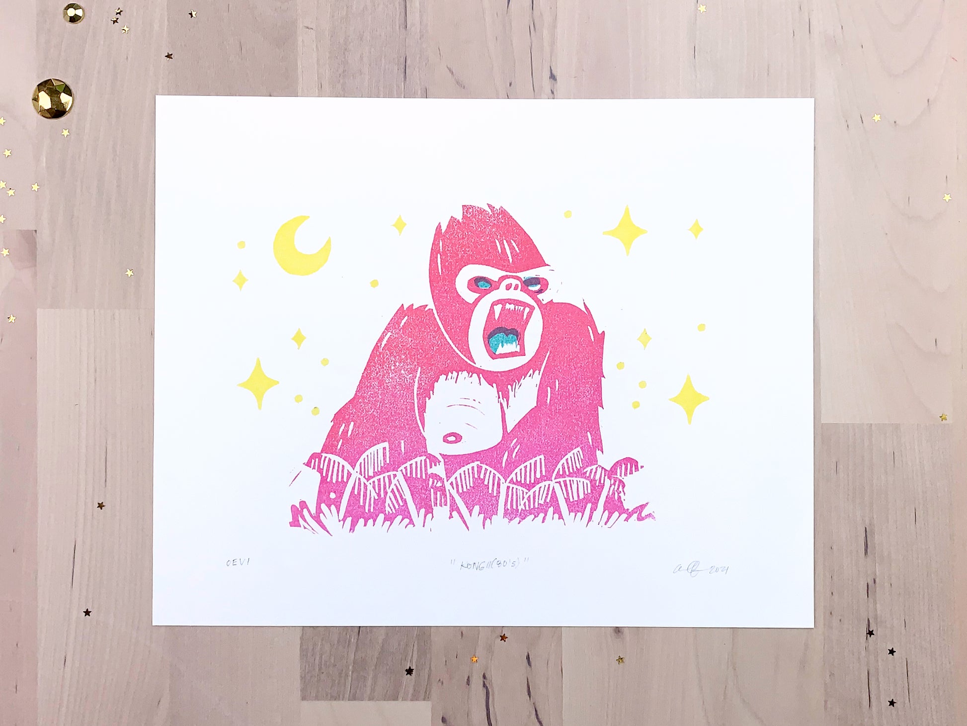 Original art print by Amber Orenstein. Relief print of a pink King Kong roaring on his jungle island home.