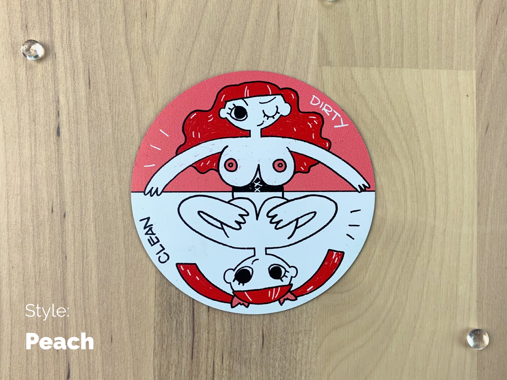 A circular sheet magnet with a sassy illustration of a redhead lady with her top off on the dirty half, and covering her boobies on the clean half.