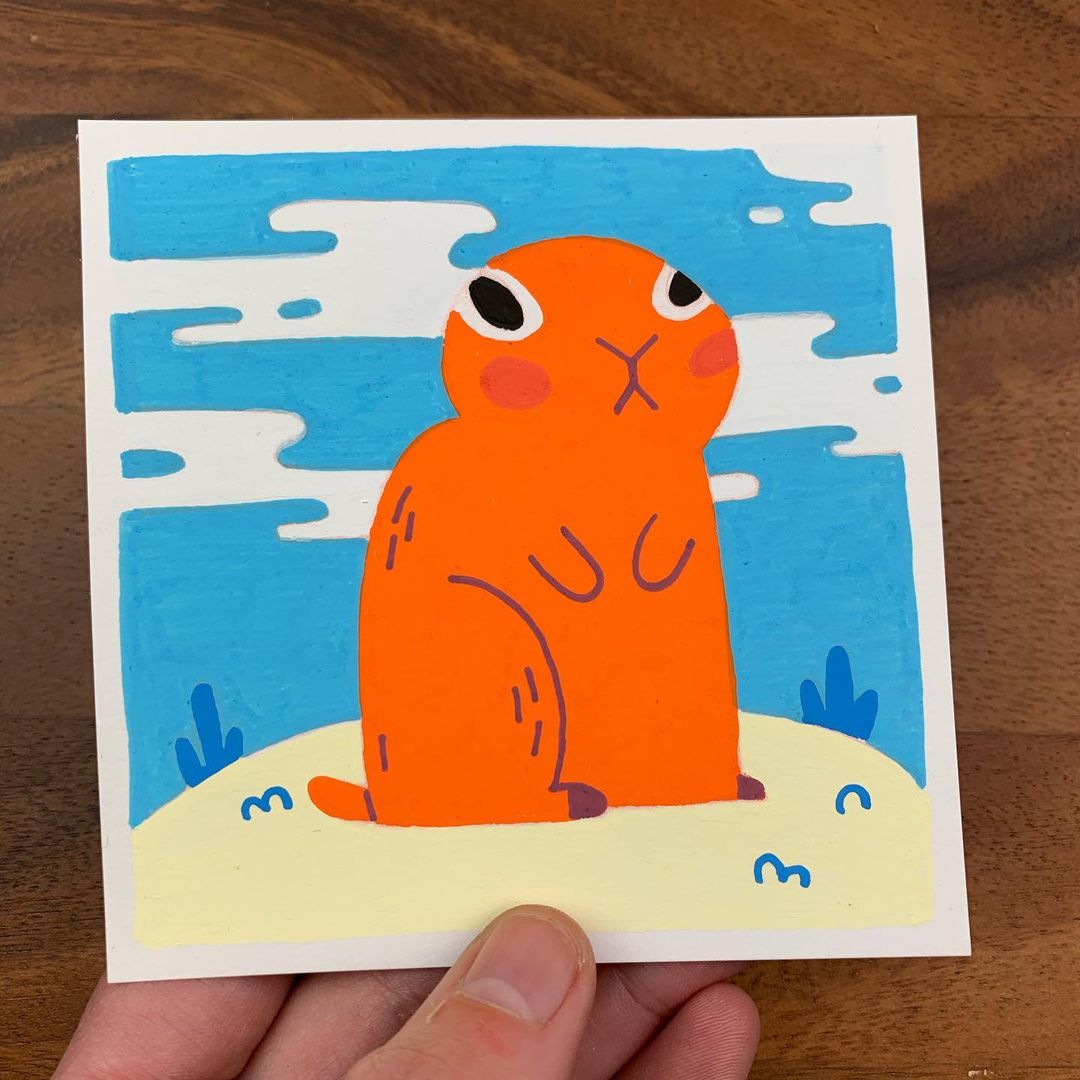 Original artwork of a cute orange prairie dog standing on top of a mound with a blue sky and white clouds. Materials used: Uni-Posca paint markers.