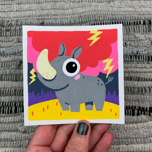 Original artwork of a cute rhinoceros in a lightning storm. Materials used: Uni-Posca paint markers.