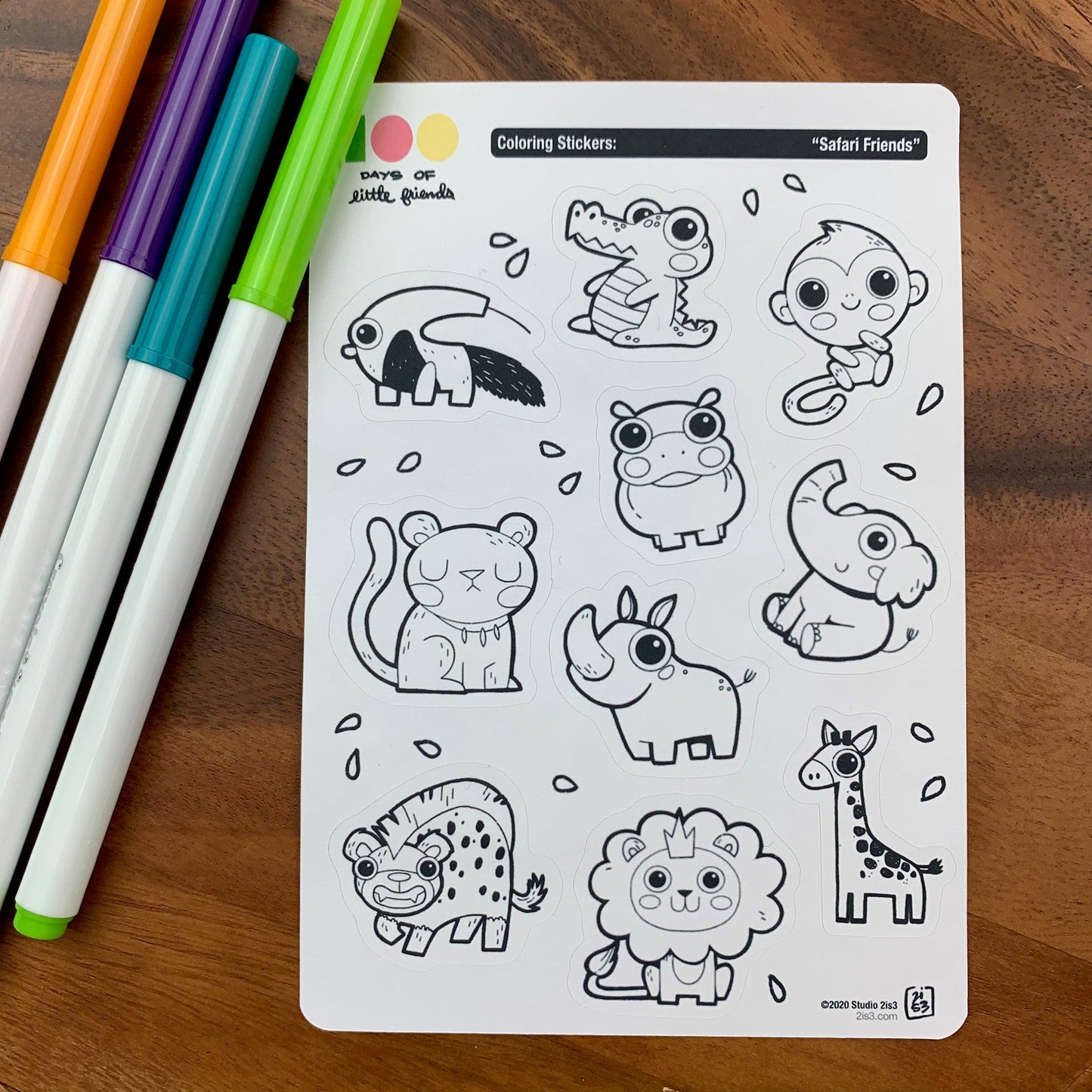 Markers and a sticker sheet with 10 little animal stickers on it. A Anteater, Alligator, Monkey, Hippo, Panther, Rhino, Elephant, Hyena, Lion, and Giraffe.