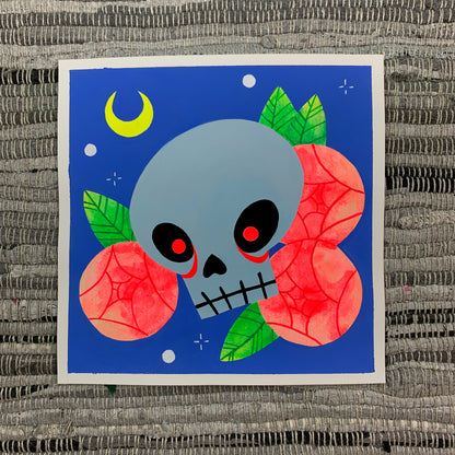 Gouache painting of a skull with glowing red eyes.