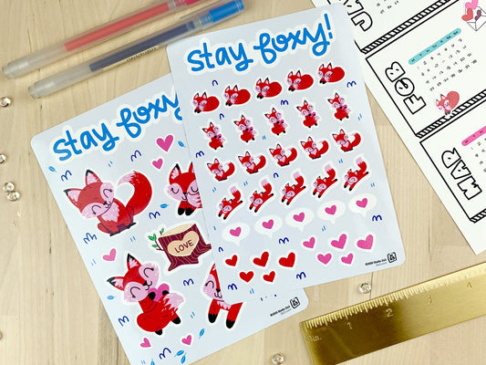 Two sticker sheets of cute little foxes and hearts.