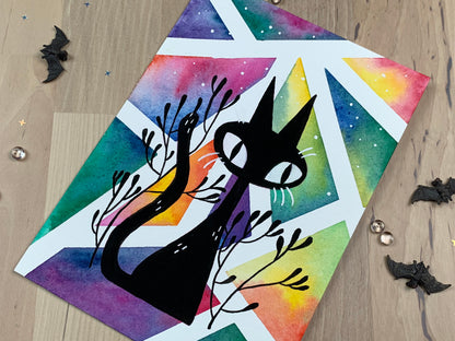 Original artwork depicting a colorful geometric watercolor and gouache painting of a black cat.