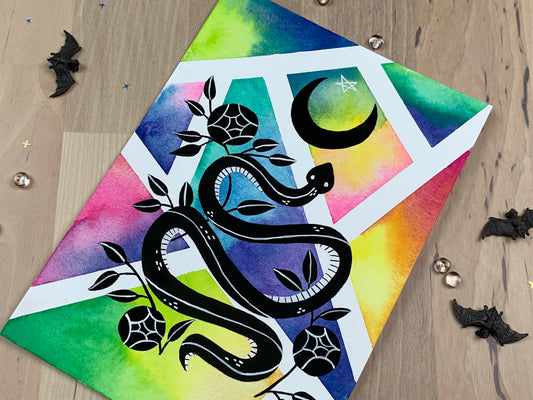 Original artwork depicting a colorful geometric watercolor and gouache painting of a snake with roses and a crescent moon.