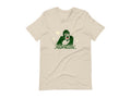 T-shirt with block print style art by Amber Orenstein.  Beige shirt with green King Kong, yellow stars, and red eyes/tongue.