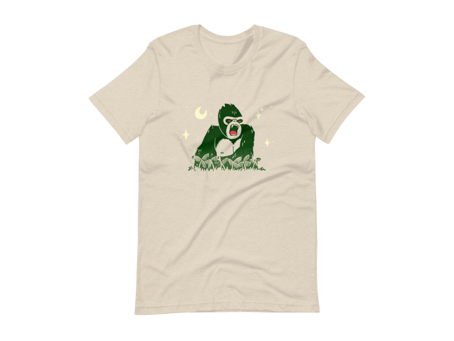 T-shirt with block print style art by Amber Orenstein.  Beige shirt with green King Kong, yellow stars, and red eyes/tongue.
