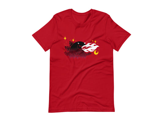 T-shirt with block print style art by Amber Orenstein. Red shirt with a black godzilla, yellow stars, and white flames coming from his mouth.