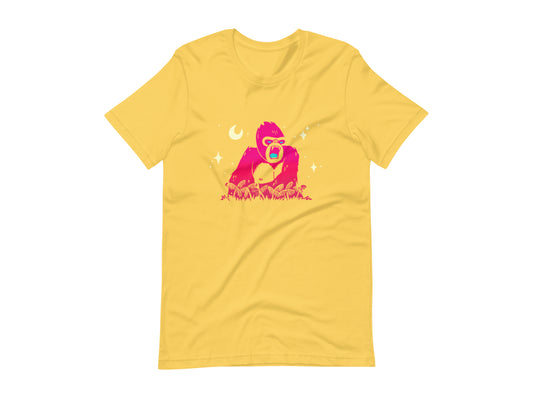 T-shirt with block print style art by Amber Orenstein.  Yellow shirt with pink King Kong, yellow stars, and turquoise eyes/tongue.