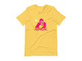 T-shirt with block print style art by Amber Orenstein.  Yellow shirt with pink King Kong, yellow stars, and turquoise eyes/tongue.