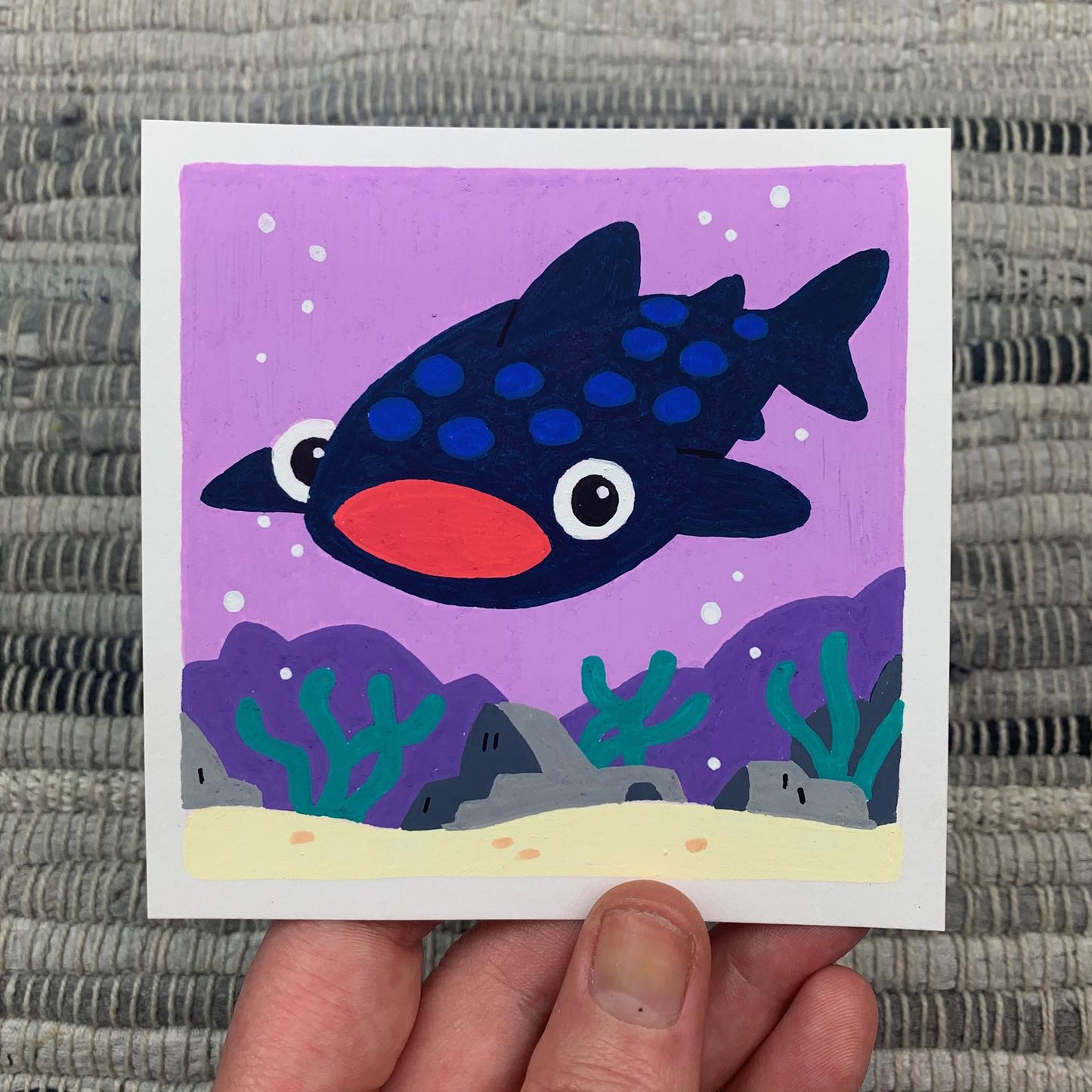 Original artwork of a cute whale shark swimming in a purple sea with his mouth open. Materials used: Uni-Posca paint markers.